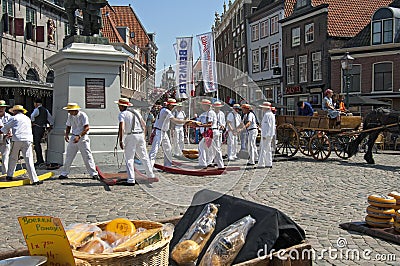 Dutch cheese market in Hoorn with working porters Editorial Stock Photo