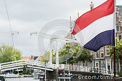 Dutch flag near the white bridge in Haarlem Stock Photo