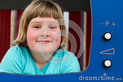 Dutch girl playing in TV Stock Photo