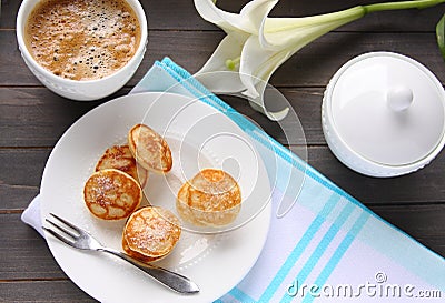 Dutch mini pancakes called poffertjes Stock Photo