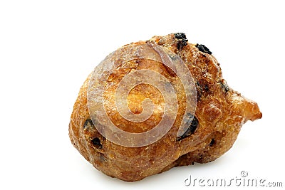 Dutch oliebol baked with currents Stock Photo