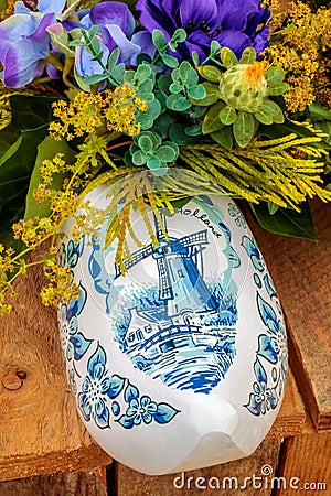 Dutch souvenir clog with painted windmill Stock Photo