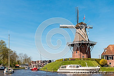 Dutch windmill against a clear blue sky Editorial Stock Photo