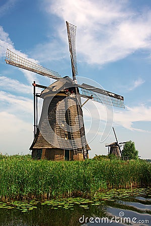 Dutch windmills in countryside Stock Photo