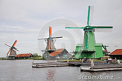 Dutch windmills on the Zaans river in Zaanse Schans, Netherlands Editorial Stock Photo