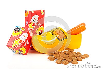 Dutch wooden shoe with presents and pepernoten Stock Photo