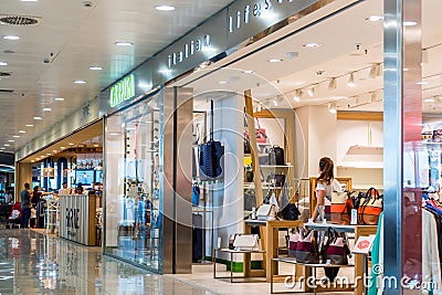 Duty free shops at the international departure hall of Naples international airport Capodichino, Italy Editorial Stock Photo