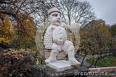 Dwarf Garden Zwergerlgarten - Pallone Player Dwarf with ball - 17th century statue - Salzburg, Austria Editorial Stock Photo