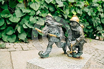 The Dwarfs of Wroclaw, Poland. Dwarfs sculptures lurking and hiding around every corner of the city Editorial Stock Photo