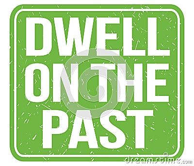 DWELL ON THE PAST, text written on green stamp sign Stock Photo