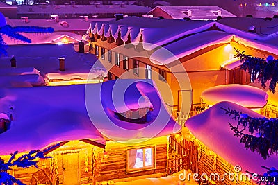 The dwellings with thick snow at night Stock Photo