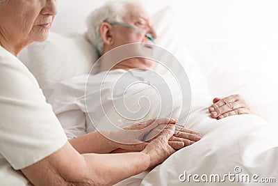 Dying senior man and his wife Stock Photo