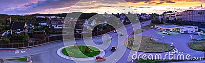 Dynamic Sunset ov norweigan town next to Stokkavannet lake and Madla Shopping Center in Stavanger Norway Stock Photo