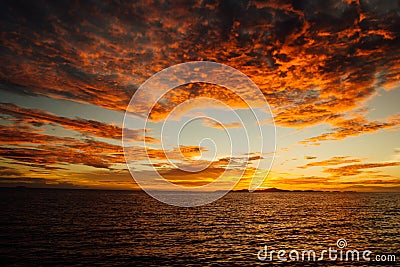 Dynamic sunset at sea Stock Photo