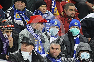 Dynamo Kiev fans wear protective masks Editorial Stock Photo