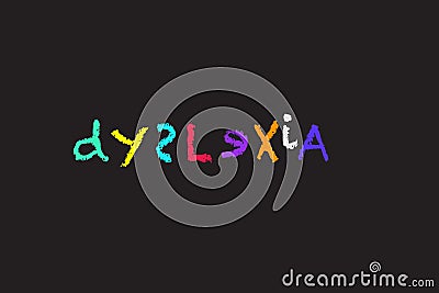 Dyslexia spelled in coloured chalk letters on a blackboard Stock Photo