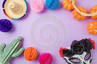 DÃ­a de los Muertos day of the dead border frame background with sugar skull mask and Mexican party decorations. Top view, flat Stock Photo