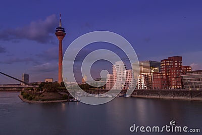 Dusseldorf, Germany - Rhine River, TV Tower and the Iconic Harbor Buildings Editorial Stock Photo