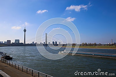 View on river rhine with ship in the morning, blurred tower and bridge background Editorial Stock Photo