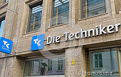 View on office facade with logo lettering of Die Techniker Krankenkasse Editorial Stock Photo