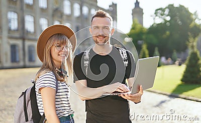 E-learning of students using laptop. Male and female studying Stock Photo