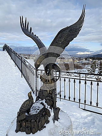 Zlatoust, Chelyabinsk region, Russia, January, 19, 2020. Eagle that brought fish to a chick in the mountain Park named after Bazho Editorial Stock Photo