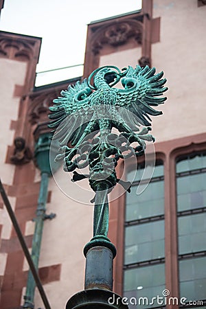 The eagle on the church door of Walluf in Germany symbol for evangelist Johannes. Stock Photo