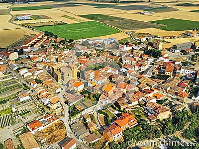 Eagle-eye shot of a town, trees, and agricultural fields - perfect for background Stock Photo
