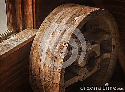 Hand Made Wooden Pulley of a Grain Elevator Stock Photo