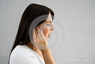 Earache And Pain. Unhappy Woman Stock Photo