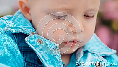 Early child health care. Baby boy. Small baby on day care. Little baby play outdoor. Improving child health and growth Stock Photo
