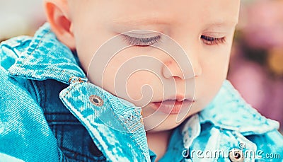 Early child health care. Baby boy. Small baby on day care. Little baby play outdoor. Improving child health and growth Stock Photo