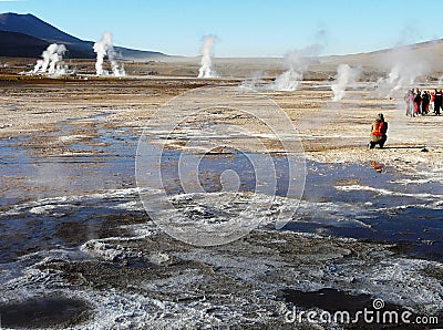 Tourists on the high mountain field of El Tatio geysers Editorial Stock Photo