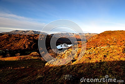 Sunlight on the Loughrigg Fell Stock Photo