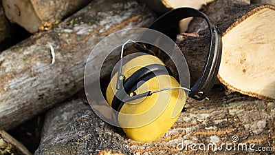 Earmuffs, ear protectors for chain saws to avoid noise Stock Photo