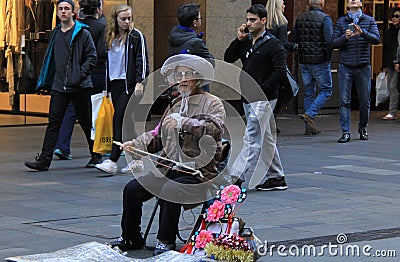 Earning with Dignity in main street in Australia Editorial Stock Photo