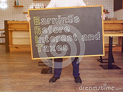 Earnings Before Interest and Taxes â€“ EBIT is shown on the conceptual business photo Stock Photo