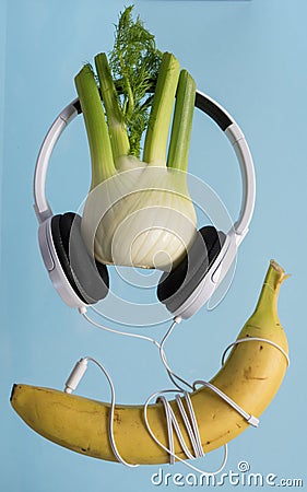 Earphones and banana popart fitness Stock Photo