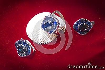 26 Earrings Ring Silver Sapphire baguette Central faceted sapphire Stock Photo