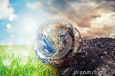 Earth is chancing due to pollution and undifferentiated trash. Save the World. World provided by NASA Stock Photo