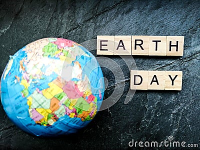 Earth day on grey background Stock Photo