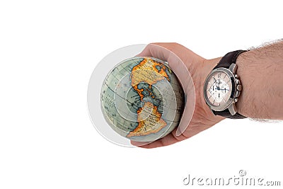 Earth globe shows continent america in a human hand and the watch shows high time Stock Photo