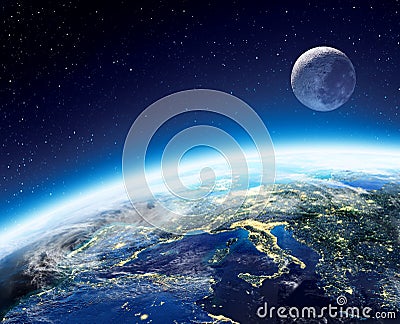 Earth and moon view from space at night Stock Photo