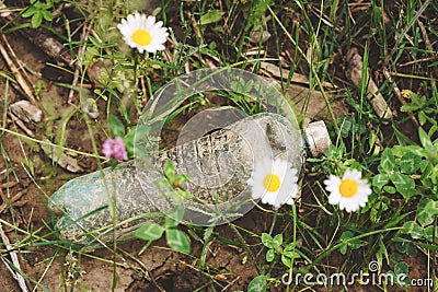 earth nature pollution with plastic waste and water bottles Stock Photo