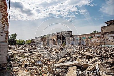 Earthquake or war aftermath or hurricane or other natural disaster, broken ruined abandoned buildings, pills of concrete garbage Stock Photo