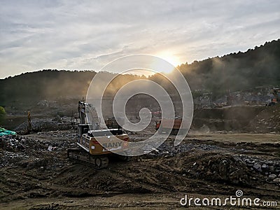 Earthwork construction site at sunset light Editorial Stock Photo