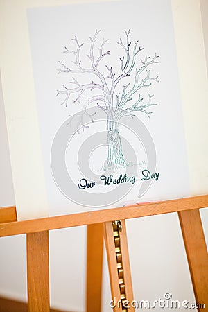 Easel with `Our wedding` day tree for quest Stock Photo