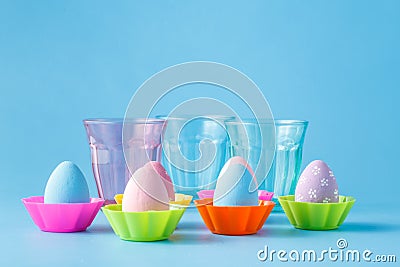 Easer colored eggs stay on blue backgrond Stock Photo