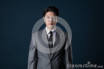 East Asian Businessman shooting studio portrait Stock Photo