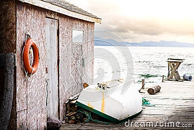 East Coast rustic boat house on a wooden dock in Newfoundland Canada Stock Photo